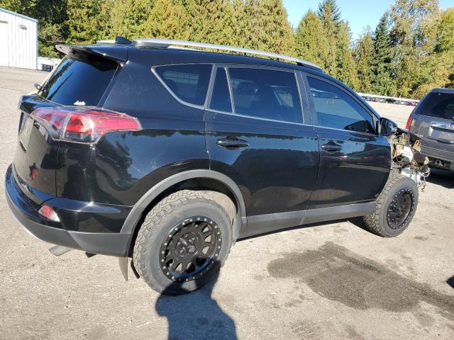 Photo 3 from auction – 2016 TOYOTA RAV4 XLE with VIN 2T3RFREV5GW538147