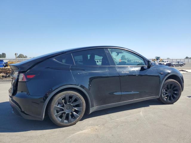 Photo 3 from auction – 2022 TESLA MODEL Y with VIN 7SAYGDEE3NF494716