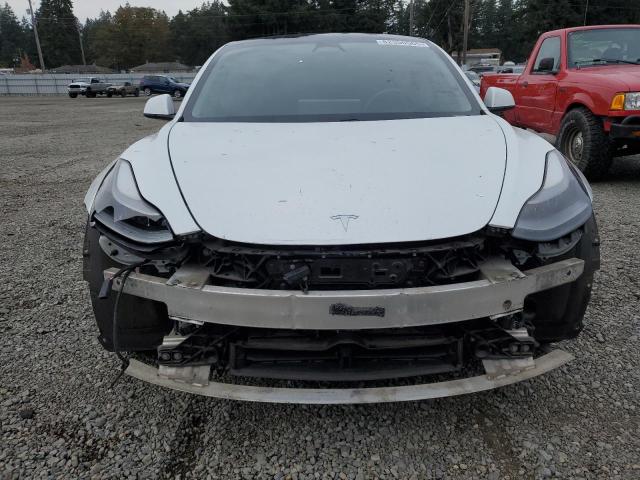 Photo 5 from auction – 2021 TESLA MODEL 3 with VIN 5YJ3E1EA6MF001912