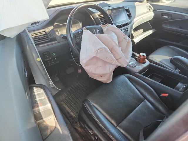 Photo 8 from auction – 2023 HONDA RIDGELINE with VIN 5FPYK3F76PB021991