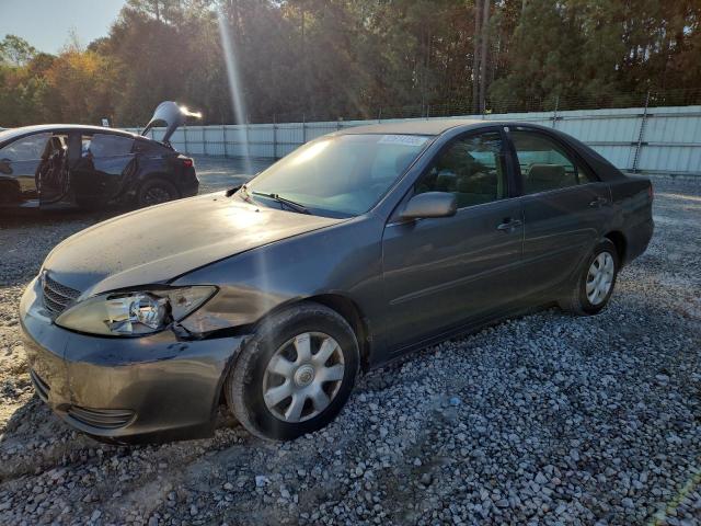 TOYOTA CAMRY LE 2004 with VIN 4T1BE32K04U861828 - Photo from auction