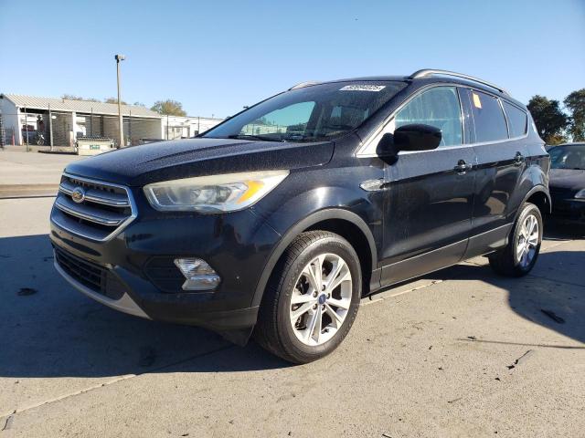 Photo 1 from auction – 2017 FORD ESCAPE SE with VIN 1FMCU9GD8HUD94507