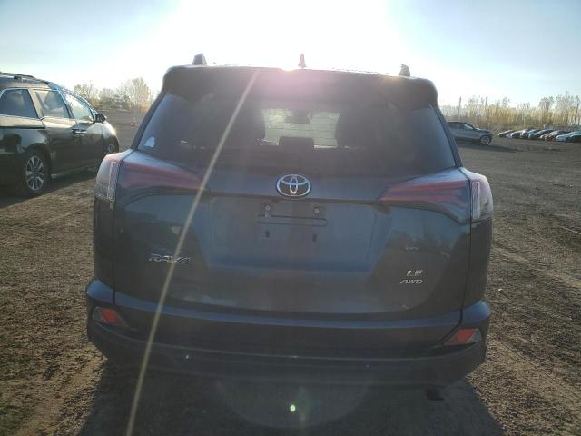Photo 6 from auction – 2018 TOYOTA RAV4 LE with VIN 2T3BFREV2JW776899