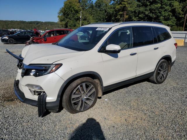 HONDA PILOT ELITE 2016 with VIN 5FNYF6H0XGB064034 - Photo from auction
