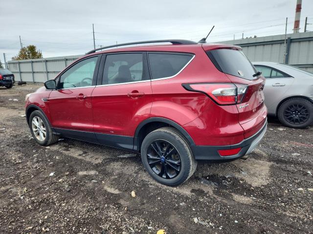 Photo 2 from auction – 2018 FORD ESCAPE SE with VIN 1FMCU9GD4JUA21888