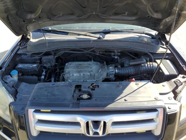 Photo 12 from auction – 2006 HONDA PILOT EX with VIN 5FNYF28586B001663
