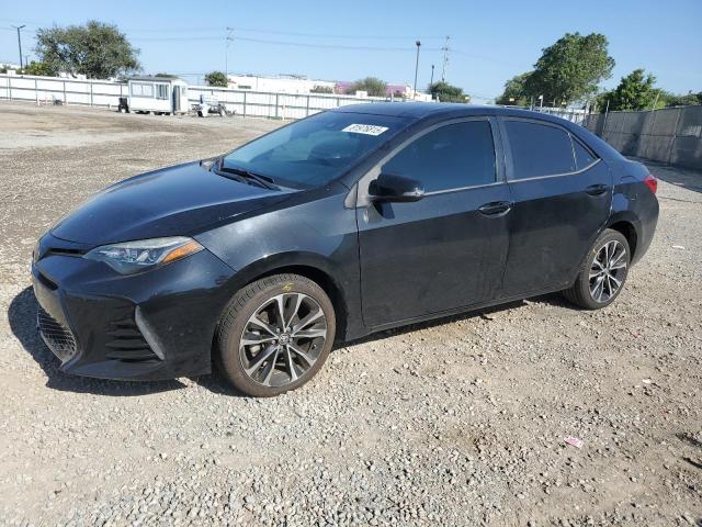 TOYOTA COROLLA L 2018 with VIN 5YFBURHE5JP763530 - Photo from auction