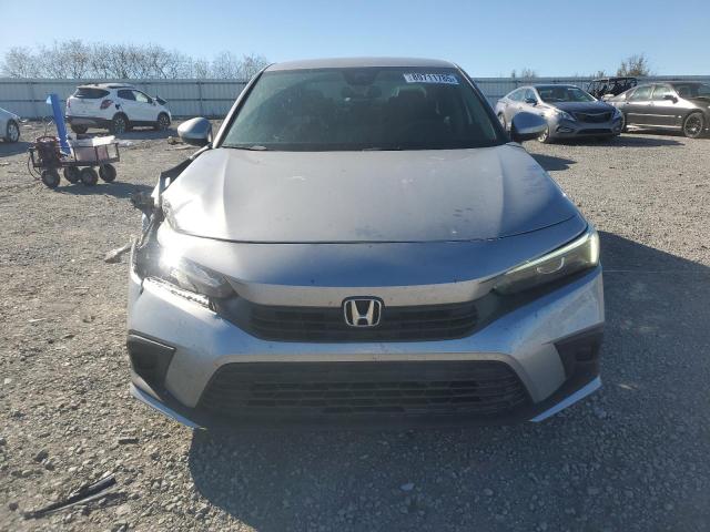 Photo 5 from auction – 2022 HONDA CIVIC LX with VIN 2HGFE2F28NH523657