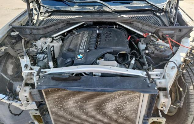 Photo 12 from auction – 2015 BMW X5 SDRIVE3 with VIN 5UXKR2C50F0H40420