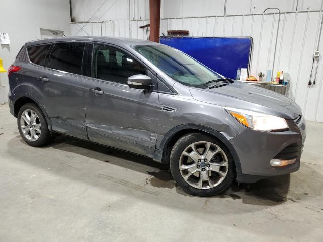 Photo 4 from auction – 2013 FORD ESCAPE with VIN 1FMCU9H98DUA79842