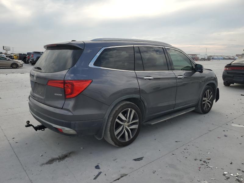 Photo 3 from auction – 2017 HONDA PILOT TOURING with VIN 5FNYF5H92HB008843