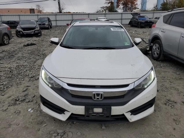 Photo 5 from auction – 2018 HONDA CIVIC EX with VIN 2HGFC2F75JH525166