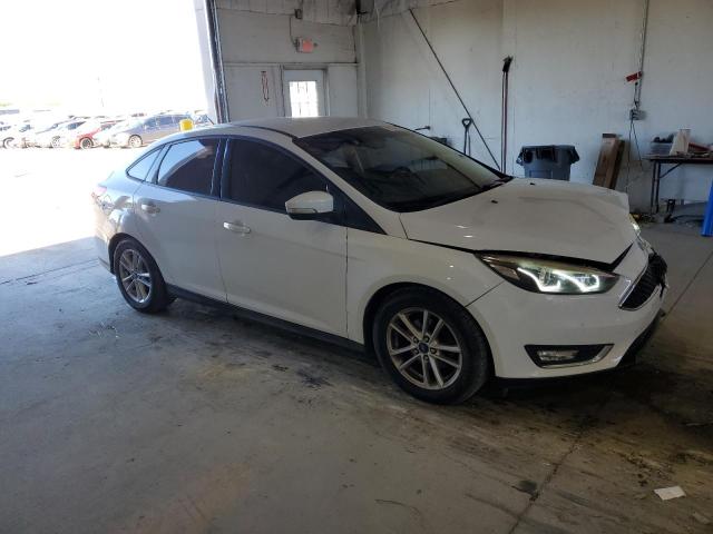 Photo 4 from auction – 2015 FORD FOCUS SE with VIN 1FADP3F29FL312953