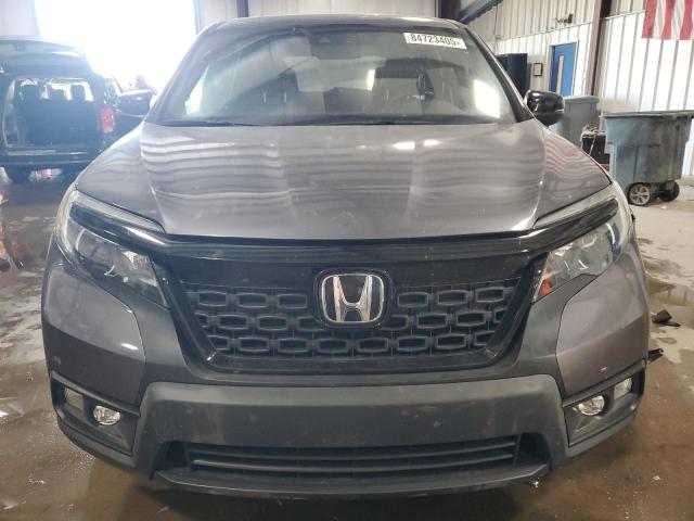 Photo 5 from auction – 2021 HONDA PASSPORT E with VIN 5FNYF8H58MB015661