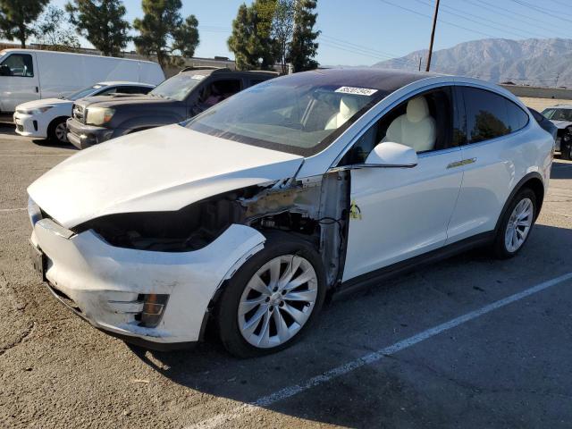 TESLA MODEL X 2020 with VIN 5YJXCDE26LF283369 - Photo from auction