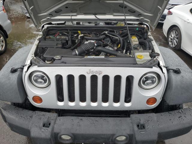 Photo 11 from auction – 2011 JEEP WRANGLER U with VIN 1J4HA3H13BL551212