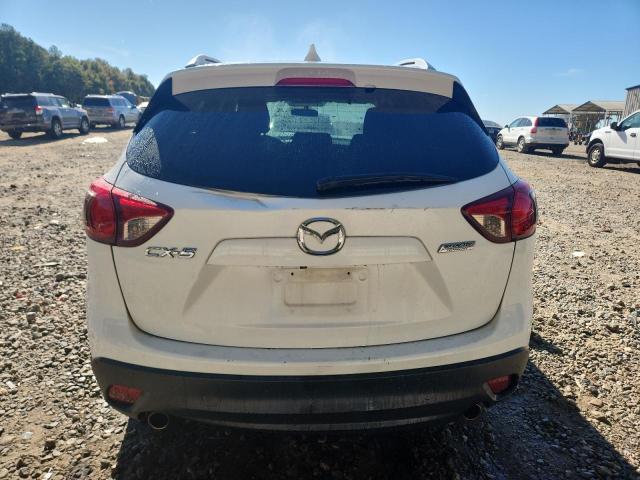 Photo 6 from auction – 2015 MAZDA CX-5 TOURI with VIN JM3KE2CY3F0551806
