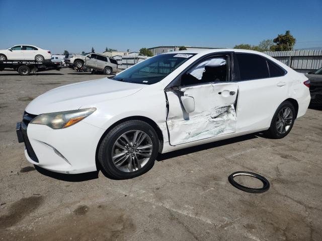 TOYOTA CAMRY LE 2016 with VIN 4T1BF1FK2GU165472 - Photo from auction