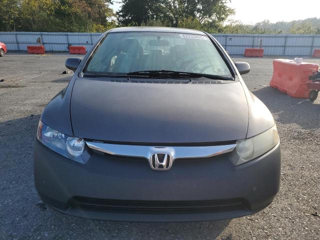 Photo 5 from auction – 2011 HONDA CIVIC LX with VIN 19XFA1F58BE046640