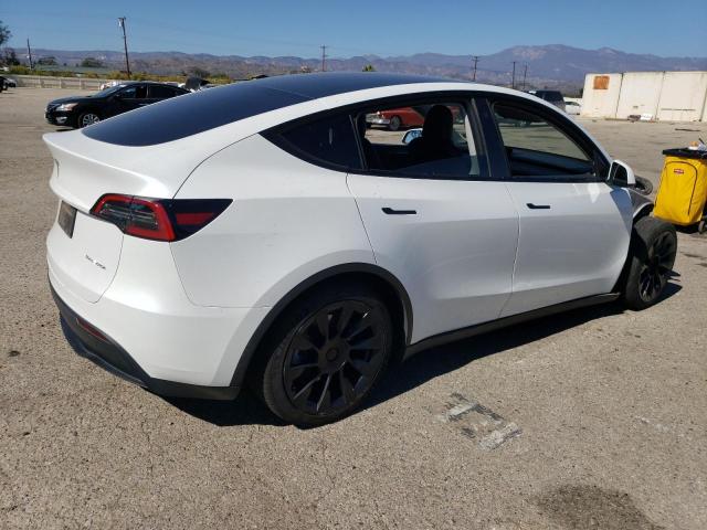 Photo 3 from auction – 2023 TESLA MODEL Y with VIN 7SAYGAEE9PF634799