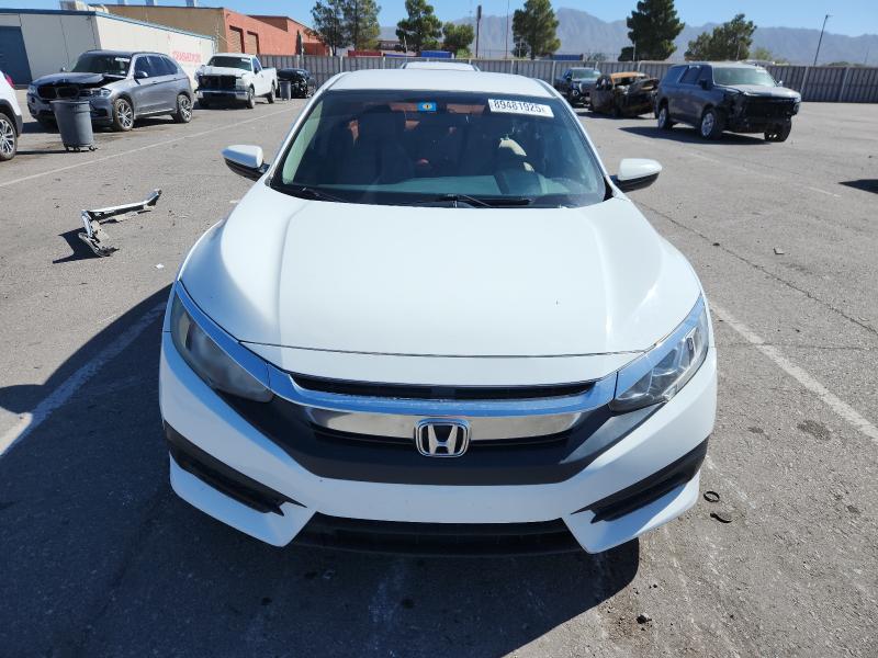 Photo 5 from auction – 2016 HONDA CIVIC LX with VIN 19XFC2F54GE071123
