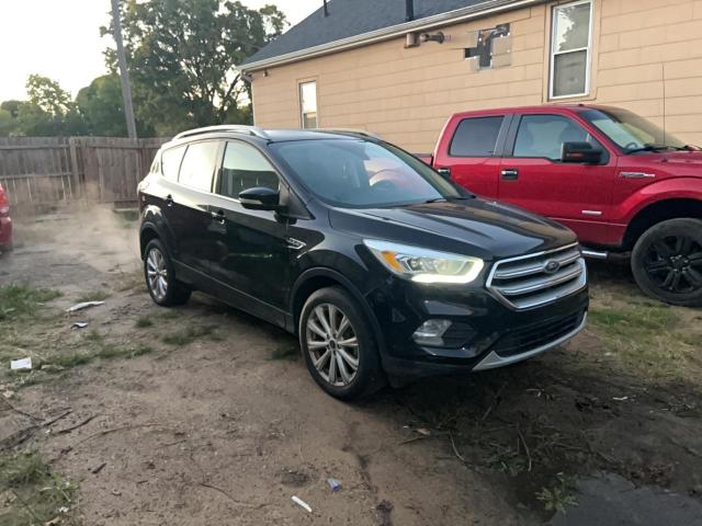 FORD ESCAPE TIT 2017 with VIN 1FMCU0JD0HUE93018 - Photo from auction