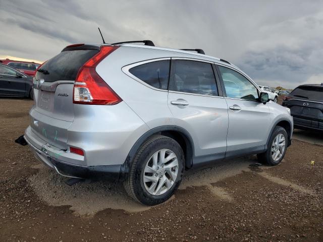 Photo 3 from auction – 2015 HONDA CR-V EXL with VIN 2HKRM4H76FH682849