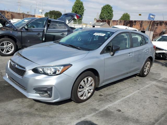 SUBARU IMPREZA 2019 with VIN 4S3GTAA62K3714468 - Photo from auction
