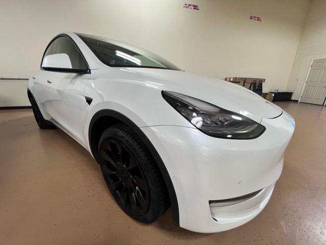 TESLA MODEL Y 2021 مع رقم تعريف المركبة 5YJYGDED7MF105899 - صورة من المزاد