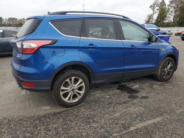Photo 3 from auction – 2018 FORD ESCAPE with VIN 1FMCU9GD5JUD35159