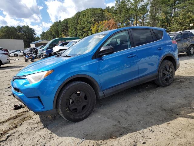 TOYOTA RAV4 LE 2017 with VIN 2T3BFREV7HW676811 - Photo from auction