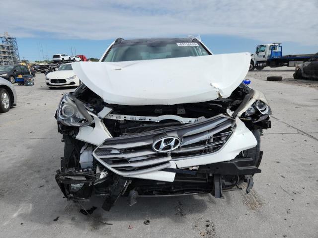 Photo 5 from auction – 2017 HYUNDAI SANTA FE S with VIN 5NMZU3LB8HH052160