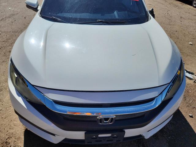 Photo 11 from auction – 2018 HONDA CIVIC EX with VIN 2HGFC2F76JH536242