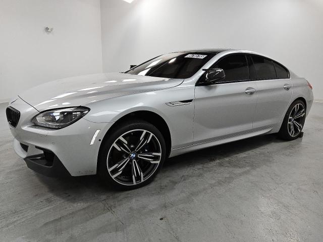 BMW 650 XI 2013 with VIN WBA6B4C5XDD097979 - Photo from auction
