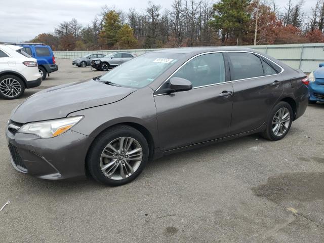TOYOTA CAMRY LE 2017 with VIN 4T1BF1FK7HU736973 - Photo from auction
