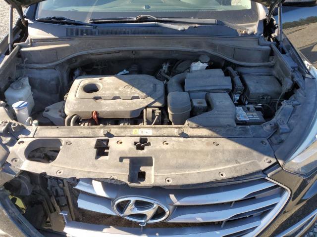 Photo 12 from auction – 2017 HYUNDAI SANTA FE S with VIN 5NMZU3LB0HH029357