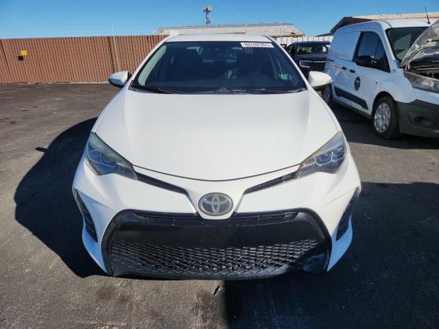 Photo 5 from auction – 2017 TOYOTA COROLLA L with VIN 5YFBURHE4HP677331
