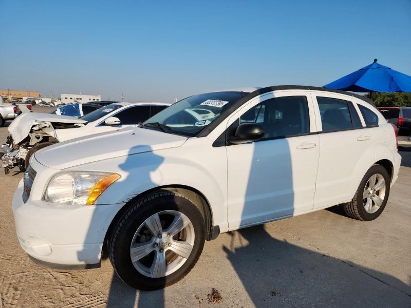 DODGE CALIBER 2011 with VIN 1B3CB3HA6BD254136 - Photo from auction