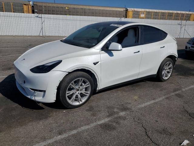 TESLA MODEL Y 2024 with VIN 7SAYGDEEXRF065871 - Photo from auction