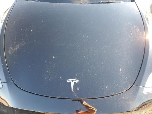 Photo 11 from auction – 2023 TESLA MODEL Y with VIN 7SAYGDEE8PF898775