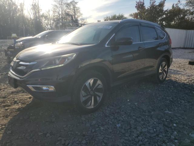 HONDA CR-V TOURI 2015 with VIN 5J6RM4H95FL074229 - Photo from auction