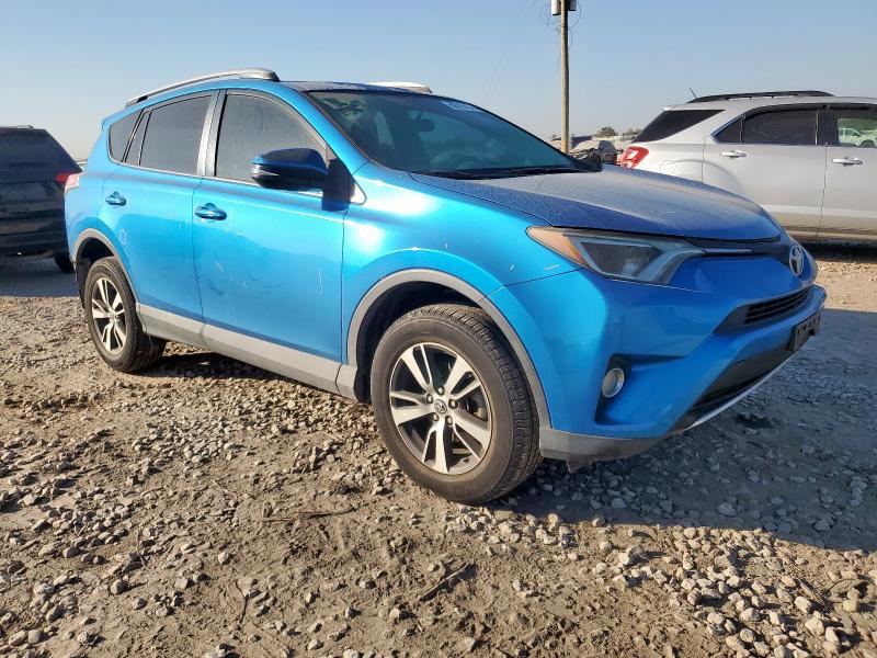 Photo 4 from auction – 2016 TOYOTA RAV4 XLE with VIN 2T3WFREV6GW251659