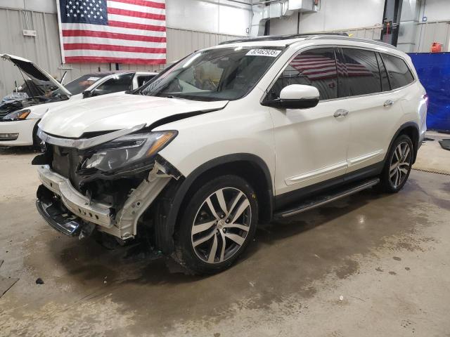 HONDA PILOT ELIT 2016 with VIN 5FNYF6H04GB044894 - Photo from auction