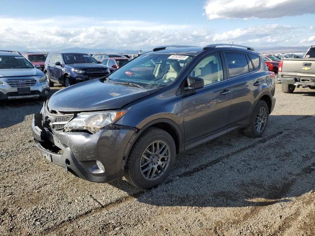 TOYOTA RAV4 LE 2014 with VIN JTMBFREV5ED048299 - Photo from auction