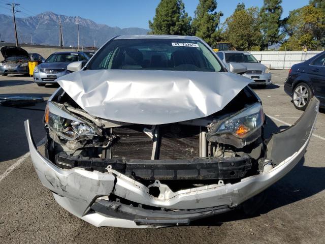 Photo 5 from auction – 2014 TOYOTA COROLLA L with VIN 5YFBURHE2EP008146