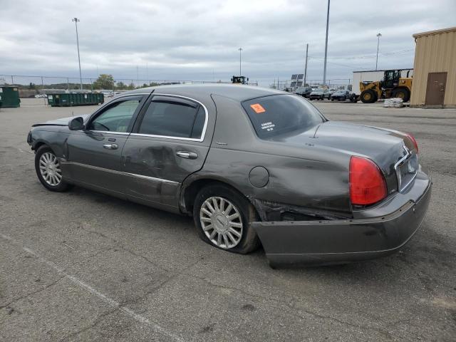 Photo 2 from auction – 2004 LINCOLN TOWN CAR E with VIN 1LNHM81W64Y627376