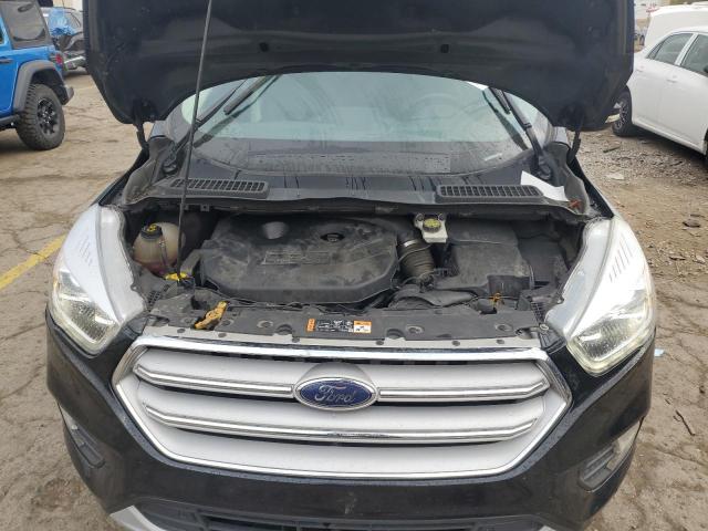 Photo 11 from auction – 2017 FORD ESCAPE TIT with VIN 1FMCU9J9XHUB01565