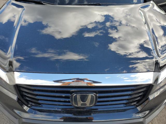 Photo 11 from auction – 2022 HONDA RIDGELINE with VIN 5FPYK3F70NB032305