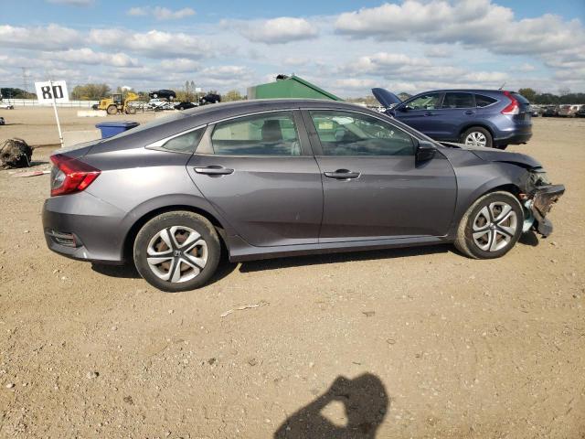 Photo 3 from auction – 2018 HONDA CIVIC LX with VIN 19XFC2F56JE033562