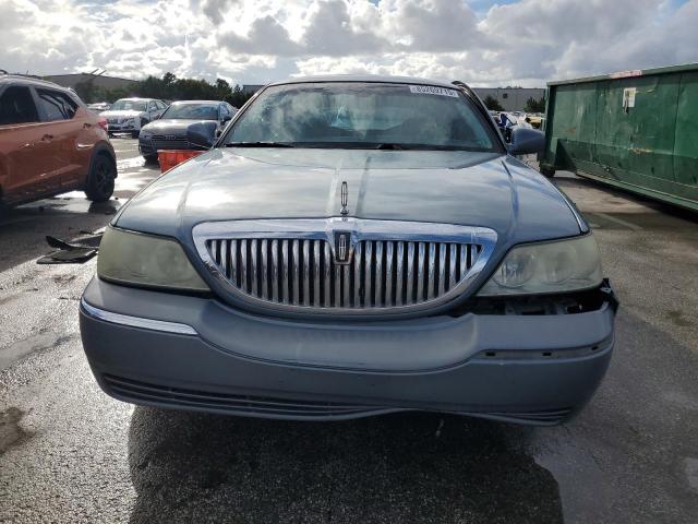 Photo 5 from auction – 2004 LINCOLN TOWN CAR with VIN 1LNHM81W84Y669323